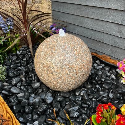 Solar Flamed Drilled Pinky Granite Sphere 40cm Natural Stone Feature
