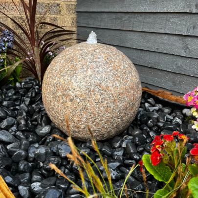 Flamed Drilled Pinky Granite Sphere 40cm Natural Stone Feature